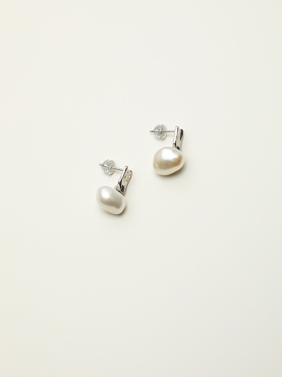 Lunar Glow · Textured Silver & Baroque Pearl Stud Earrings
