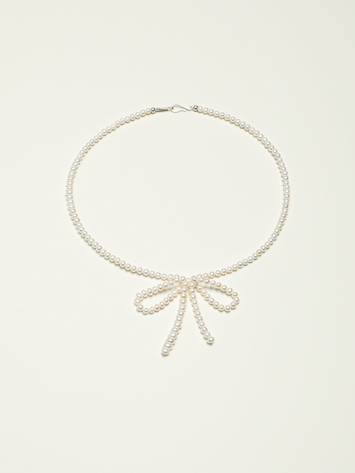 White Tide · Seed Pearl Bow Choker